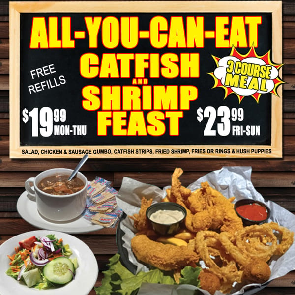 A chalkboard advertises an all-you-can-eat catfish and shrimp feast with sides of gumbo, salad, and fries.
